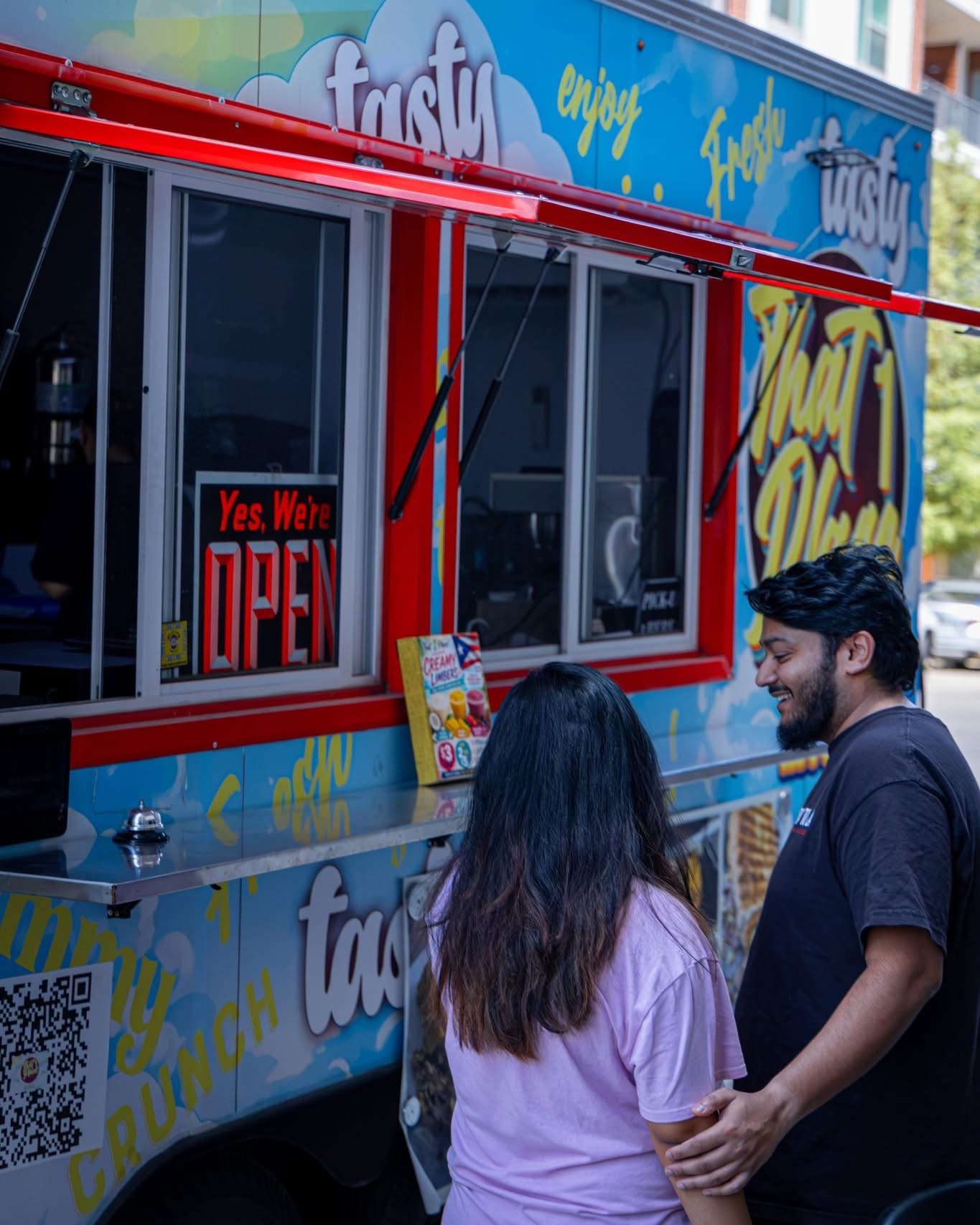 The That 1 Place food truck with its service window open